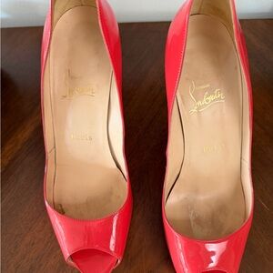Christian Louboutin coral/red Patent Heels